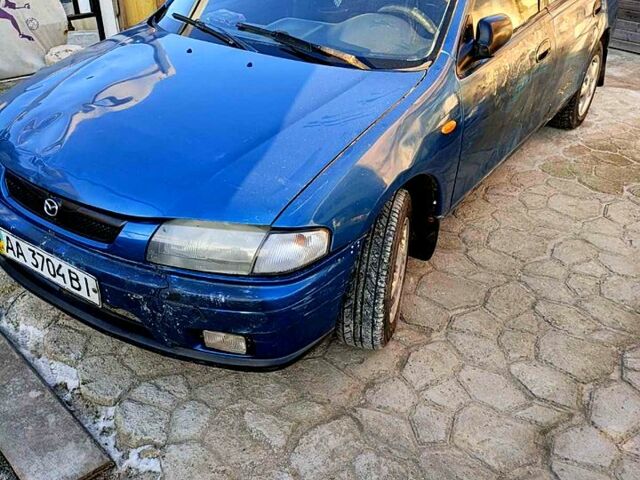 Синій Мазда 323, об'ємом двигуна 1.5 л та пробігом 168 тис. км за 1550 $, фото 1 на Automoto.ua