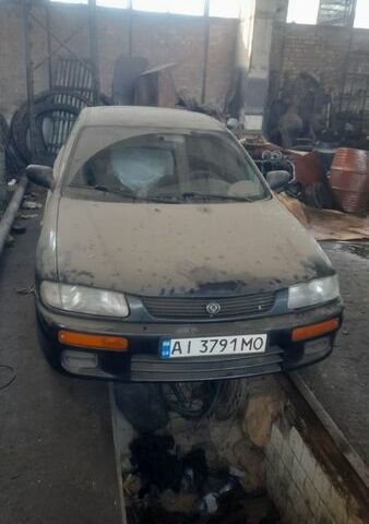 Синій Мазда 323, об'ємом двигуна 1.5 л та пробігом 190 тис. км за 800 $, фото 1 на Automoto.ua