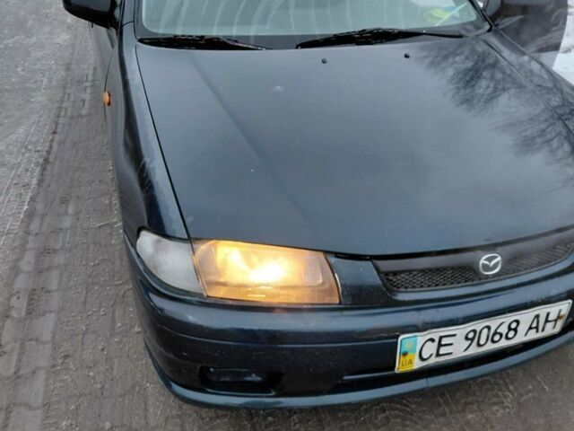 Синій Мазда 323, об'ємом двигуна 1.5 л та пробігом 363 тис. км за 1699 $, фото 1 на Automoto.ua