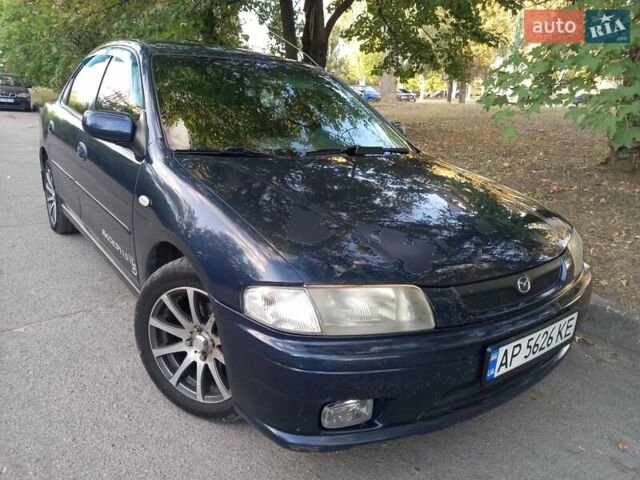Синий Мазда 323, объемом двигателя 1.8 л и пробегом 443 тыс. км за 3300 $, фото 1 на Automoto.ua