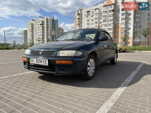 Синій Мазда 323, об'ємом двигуна 1.5 л та пробігом 471 тис. км за 2500 $, фото 1 на Automoto.ua