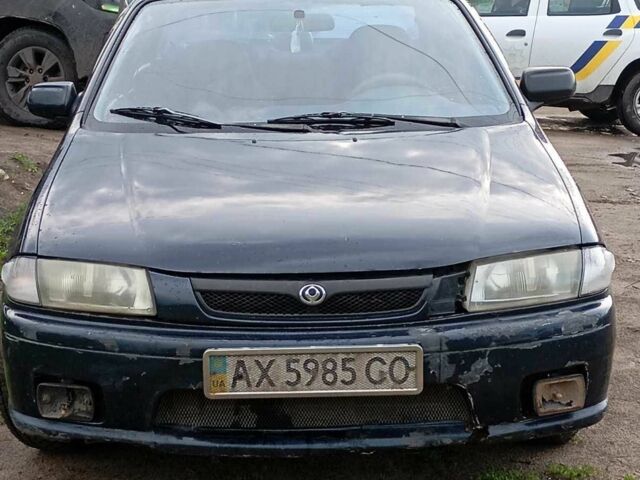 Синий Мазда 323, объемом двигателя 1.5 л и пробегом 1 тыс. км за 900 $, фото 1 на Automoto.ua