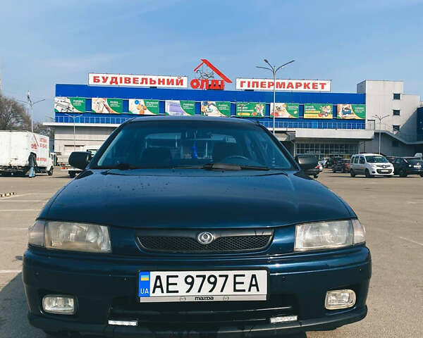 Синий Мазда 323, объемом двигателя 1.5 л и пробегом 320 тыс. км за 3200 $, фото 1 на Automoto.ua