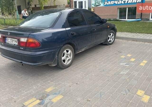 Синий Мазда 323, объемом двигателя 1.5 л и пробегом 430 тыс. км за 2200 $, фото 1 на Automoto.ua