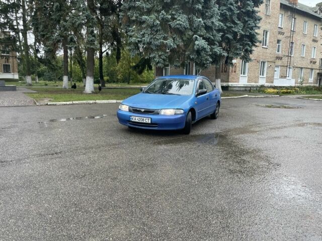 Синий Мазда 323, объемом двигателя 0 л и пробегом 365 тыс. км за 1500 $, фото 1 на Automoto.ua