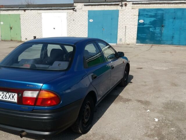 Синій Мазда 323, об'ємом двигуна 1.5 л та пробігом 250 тис. км за 2100 $, фото 1 на Automoto.ua