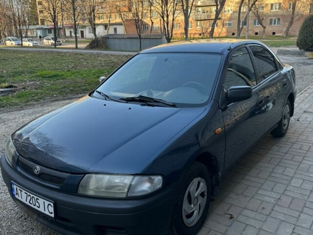 Синій Мазда 323, об'ємом двигуна 1.5 л та пробігом 360 тис. км за 1150 $, фото 1 на Automoto.ua