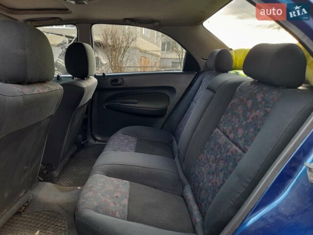 Синий Мазда 323, объемом двигателя 1.8 л и пробегом 238 тыс. км за 3200 $, фото 1 на Automoto.ua
