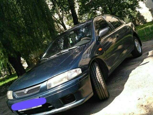Синий Мазда 323, объемом двигателя 1.5 л и пробегом 175 тыс. км за 2800 $, фото 1 на Automoto.ua