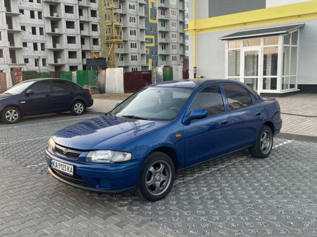 Синій Мазда 323, об'ємом двигуна 1.5 л та пробігом 349 тис. км за 2700 $, фото 1 на Automoto.ua