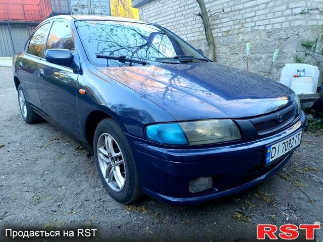 Синій Мазда 323, об'ємом двигуна 1.5 л та пробігом 280 тис. км за 1850 $, фото 1 на Automoto.ua