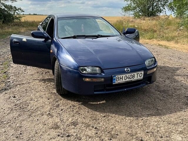 Синий Мазда 323, объемом двигателя 1.5 л и пробегом 281 тыс. км за 2500 $, фото 1 на Automoto.ua