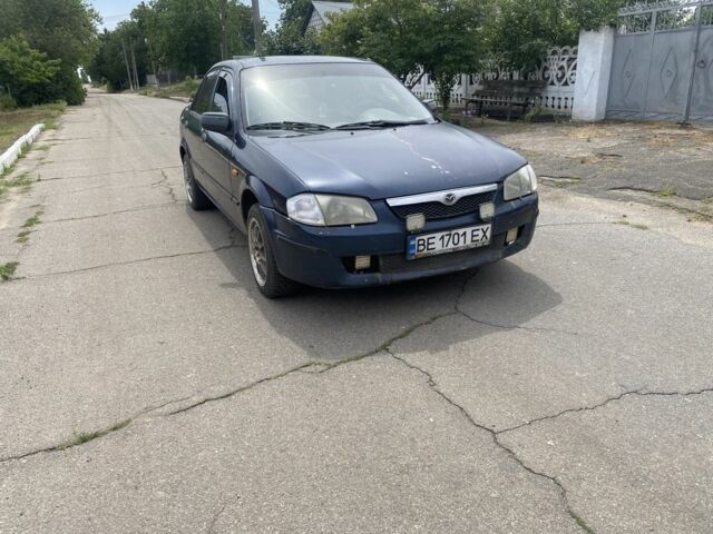 Синий Мазда 323, объемом двигателя 1.5 л и пробегом 400 тыс. км за 1600 $, фото 1 на Automoto.ua