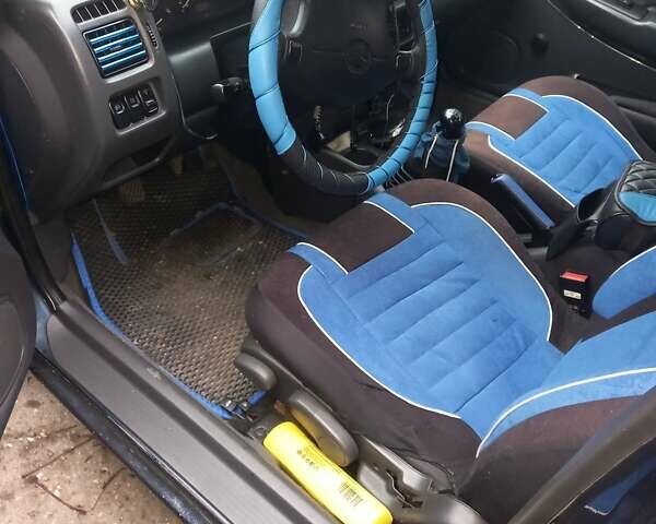 Синій Мазда 323, об'ємом двигуна 1.5 л та пробігом 300 тис. км за 2600 $, фото 1 на Automoto.ua