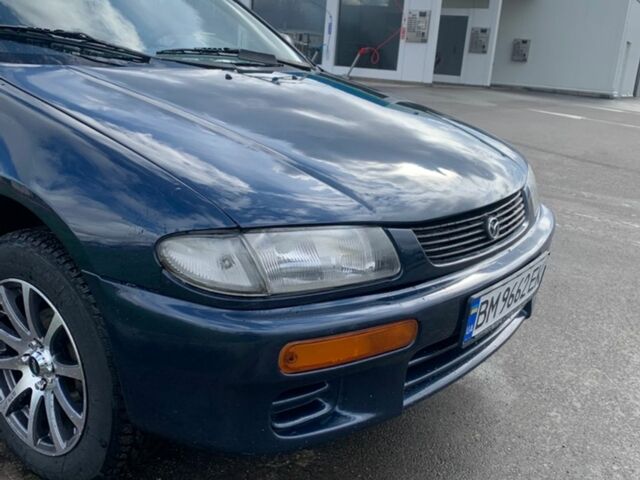 Синий Мазда 323, объемом двигателя 1.5 л и пробегом 240 тыс. км за 2700 $, фото 1 на Automoto.ua