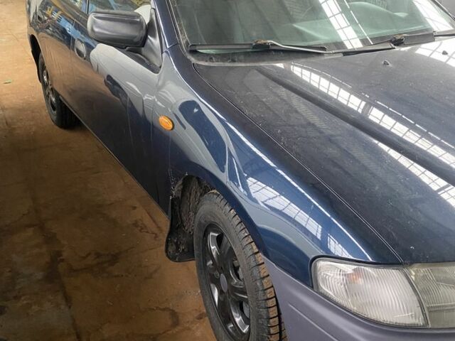 Синий Мазда 323, объемом двигателя 1.5 л и пробегом 260 тыс. км за 2620 $, фото 1 на Automoto.ua