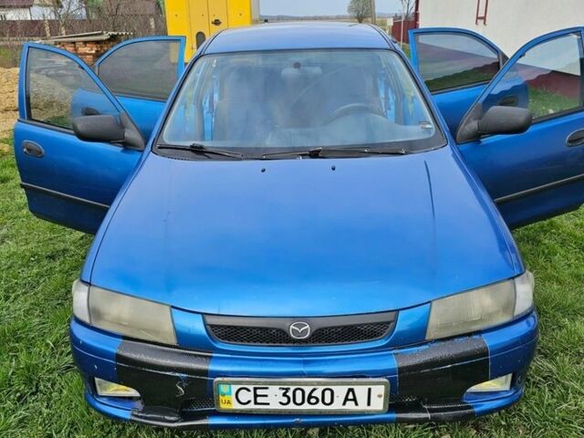 Синий Мазда 323, объемом двигателя 1.5 л и пробегом 288 тыс. км за 2300 $, фото 1 на Automoto.ua