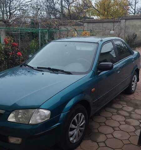 Синий Мазда 323, объемом двигателя 1.5 л и пробегом 280 тыс. км за 2700 $, фото 1 на Automoto.ua