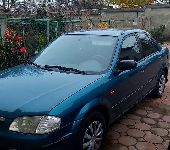 Синий Мазда 323, объемом двигателя 1.5 л и пробегом 280 тыс. км за 2700 $, фото 1 на Automoto.ua