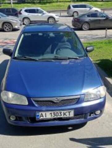 Синій Мазда 323, об'ємом двигуна 1.5 л та пробігом 410 тис. км за 2500 $, фото 1 на Automoto.ua