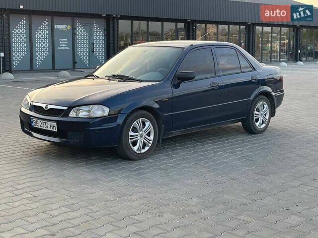 Синий Мазда 323, объемом двигателя 1.6 л и пробегом 237 тыс. км за 2700 $, фото 1 на Automoto.ua