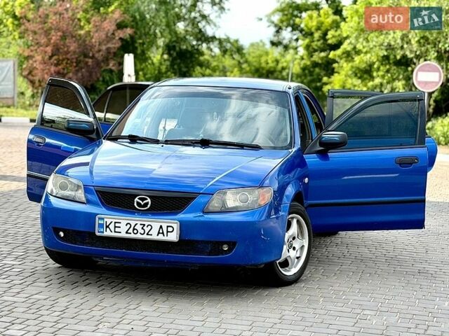 Синий Мазда 323, объемом двигателя 2 л и пробегом 223 тыс. км за 2600 $, фото 1 на Automoto.ua