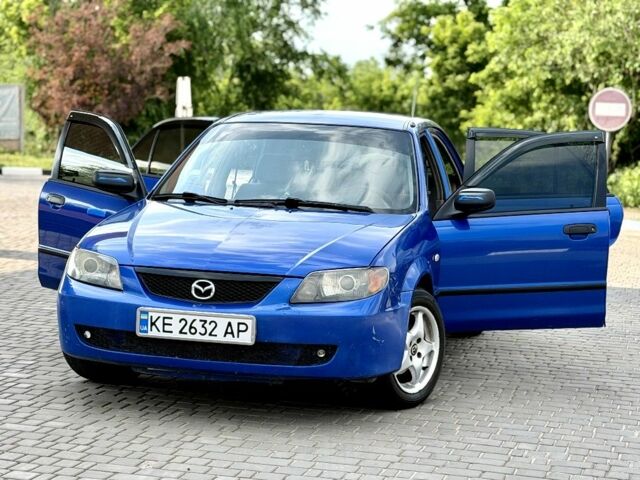 Синий Мазда 323, объемом двигателя 2 л и пробегом 223 тыс. км за 2600 $, фото 1 на Automoto.ua