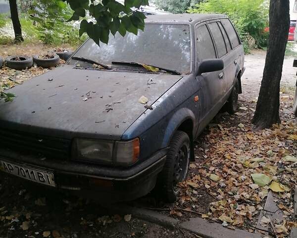 Синій Мазда 323, об'ємом двигуна 0 л та пробігом 350 тис. км за 600 $, фото 1 на Automoto.ua