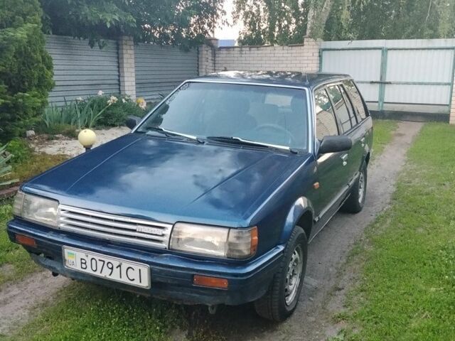 Синий Мазда 323, объемом двигателя 0 л и пробегом 300 тыс. км за 1117 $, фото 1 на Automoto.ua