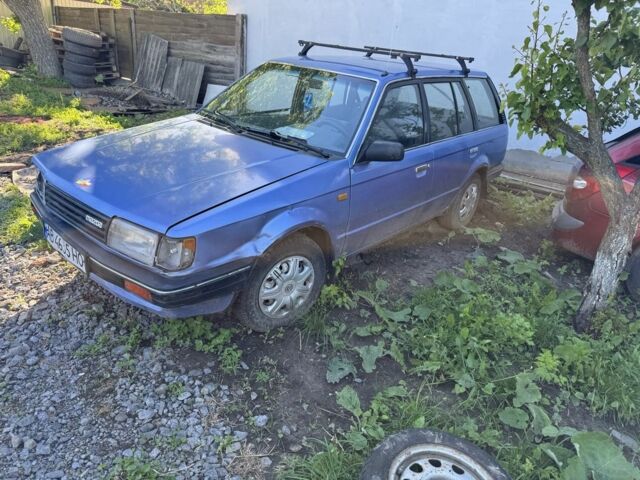 Синий Мазда 323, объемом двигателя 1.5 л и пробегом 145 тыс. км за 420 $, фото 1 на Automoto.ua