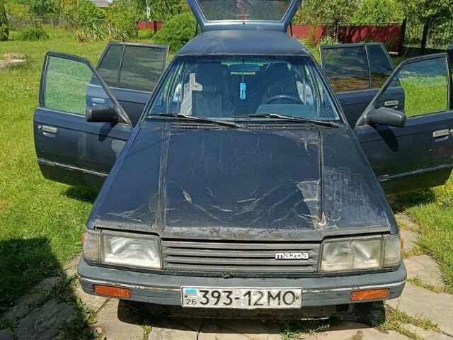 Синий Мазда 323, объемом двигателя 1.7 л и пробегом 400 тыс. км за 600 $, фото 1 на Automoto.ua