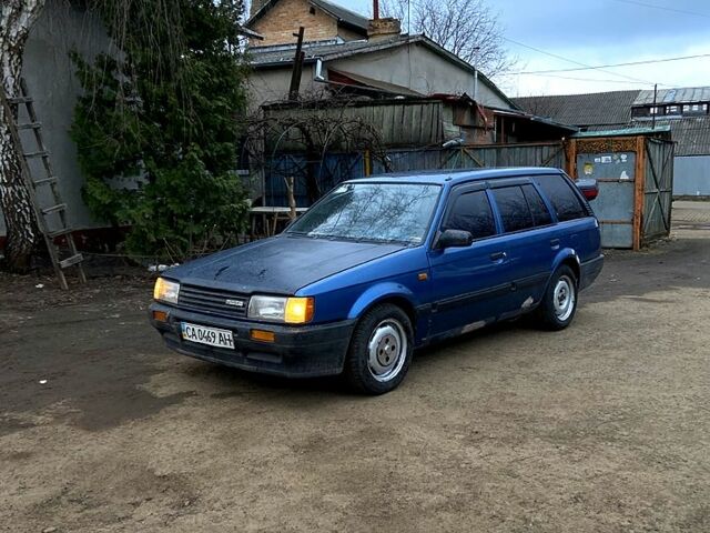 Синій Мазда 323, об'ємом двигуна 1.6 л та пробігом 418 тис. км за 850 $, фото 1 на Automoto.ua