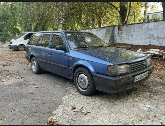 Синий Мазда 323, объемом двигателя 0 л и пробегом 300 тыс. км за 600 $, фото 1 на Automoto.ua