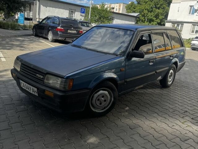 Синій Мазда 323, об'ємом двигуна 1.6 л та пробігом 250 тис. км за 351 $, фото 1 на Automoto.ua