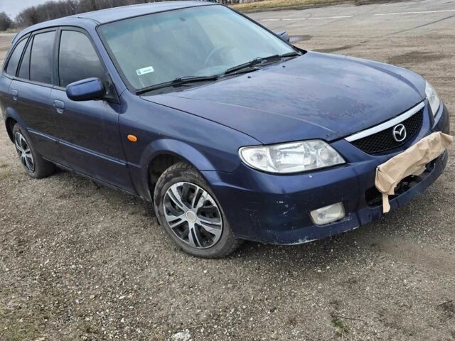 Синий Мазда 323, объемом двигателя 0 л и пробегом 330 тыс. км за 1000 $, фото 1 на Automoto.ua