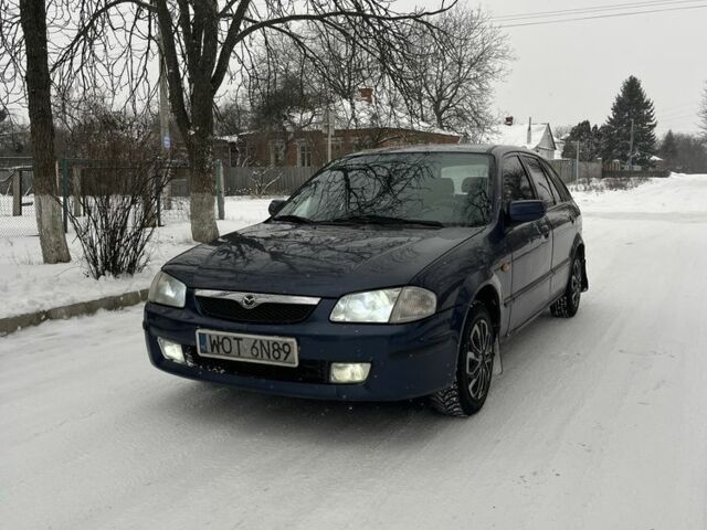 Синий Мазда 323, объемом двигателя 2 л и пробегом 2 тыс. км за 1200 $, фото 1 на Automoto.ua