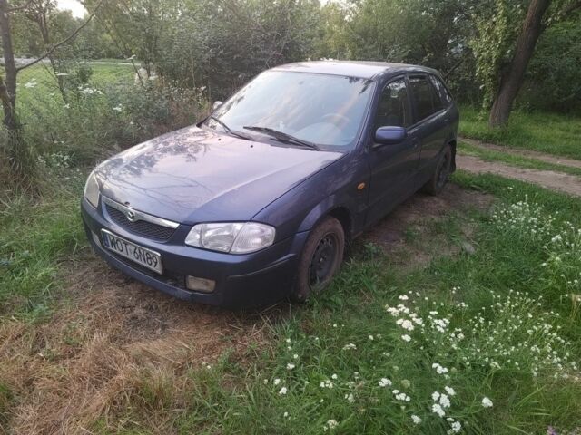 Синій Мазда 323, об'ємом двигуна 2 л та пробігом 236 тис. км за 1109 $, фото 1 на Automoto.ua