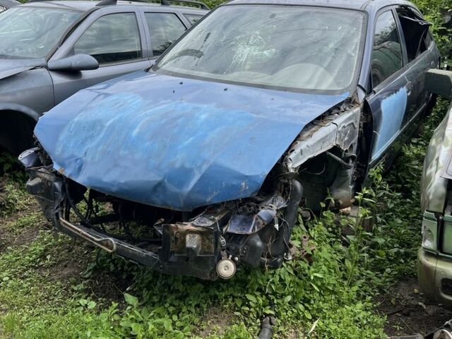 Синій Мазда 323, об'ємом двигуна 2 л та пробігом 200 тис. км за 330 $, фото 1 на Automoto.ua