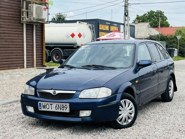 Синій Мазда 323, об'ємом двигуна 2 л та пробігом 155 тис. км за 1494 $, фото 1 на Automoto.ua