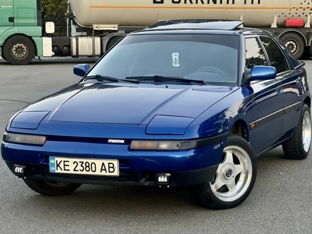 Синій Мазда 323, об'ємом двигуна 1.6 л та пробігом 250 тис. км за 2950 $, фото 1 на Automoto.ua