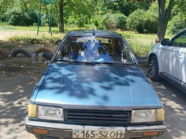 Зелений Мазда 323, об'ємом двигуна 1 л та пробігом 16 тис. км за 561 $, фото 1 на Automoto.ua