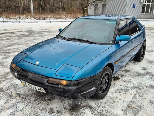 Зелений Мазда 323, об'ємом двигуна 1.6 л та пробігом 195 тис. км за 999 $, фото 1 на Automoto.ua