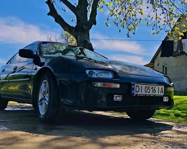 Зелений Мазда 323, об'ємом двигуна 1.49 л та пробігом 280 тис. км за 2500 $, фото 1 на Automoto.ua