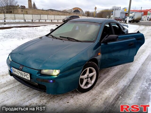 Зеленый Мазда 323, объемом двигателя 1.5 л и пробегом 174 тыс. км за 1999 $, фото 1 на Automoto.ua