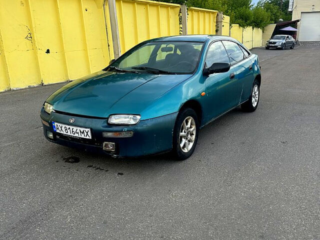 Зеленый Мазда 323, объемом двигателя 1.5 л и пробегом 250 тыс. км за 1350 $, фото 1 на Automoto.ua