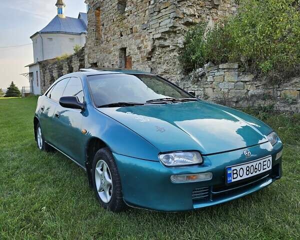 Зеленый Мазда 323, объемом двигателя 1.49 л и пробегом 359 тыс. км за 3199 $, фото 1 на Automoto.ua