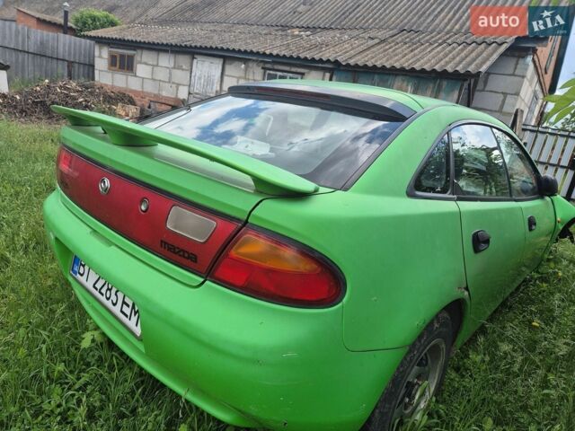 Зеленый Мазда 323, объемом двигателя 1.84 л и пробегом 460 тыс. км за 700 $, фото 1 на Automoto.ua