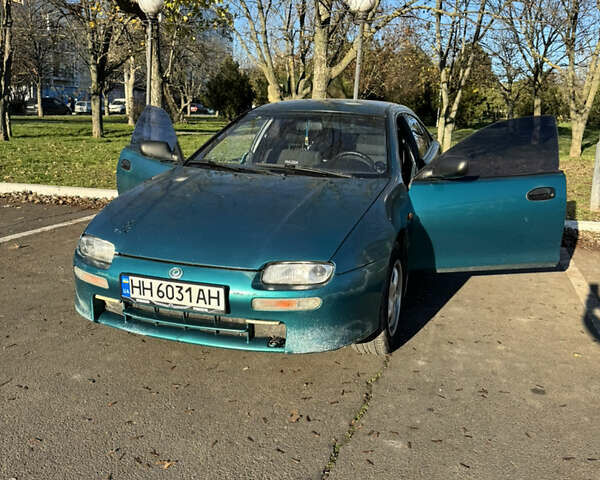 Зеленый Мазда 323, объемом двигателя 1.5 л и пробегом 308 тыс. км за 2300 $, фото 1 на Automoto.ua