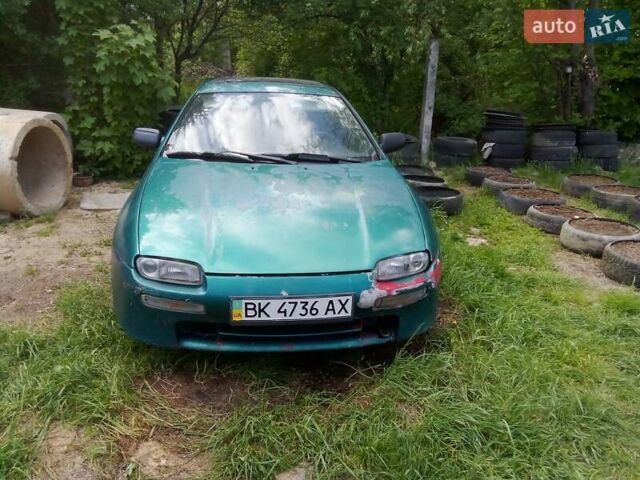 Зеленый Мазда 323, объемом двигателя 1.8 л и пробегом 320 тыс. км за 1700 $, фото 1 на Automoto.ua