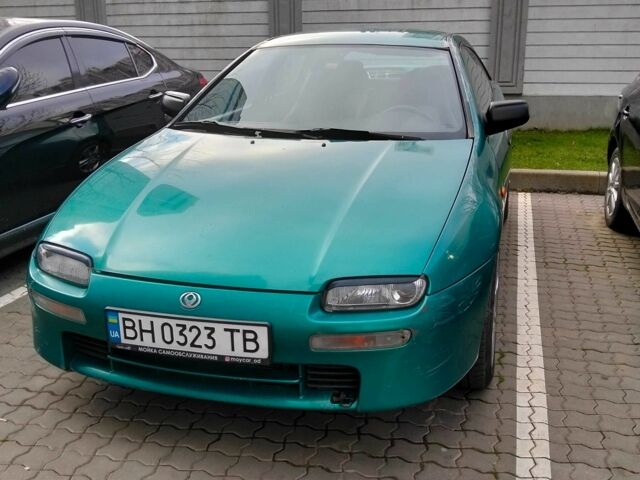 Зеленый Мазда 323, объемом двигателя 1.8 л и пробегом 161 тыс. км за 3200 $, фото 1 на Automoto.ua